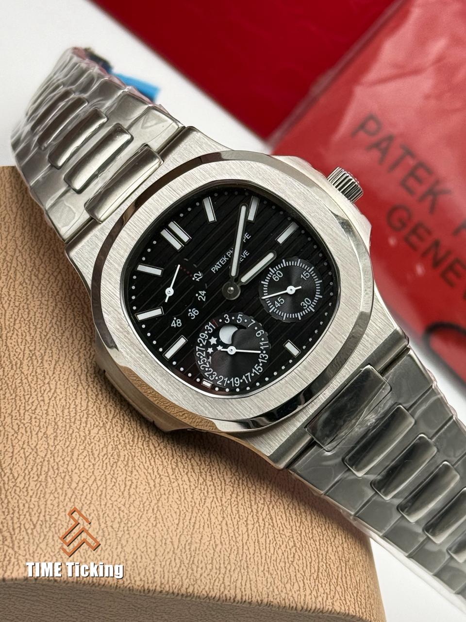 Patek Philippe Nautilus Moonphase 40mm Stainless Steel Black Gradient dial. - Image 7