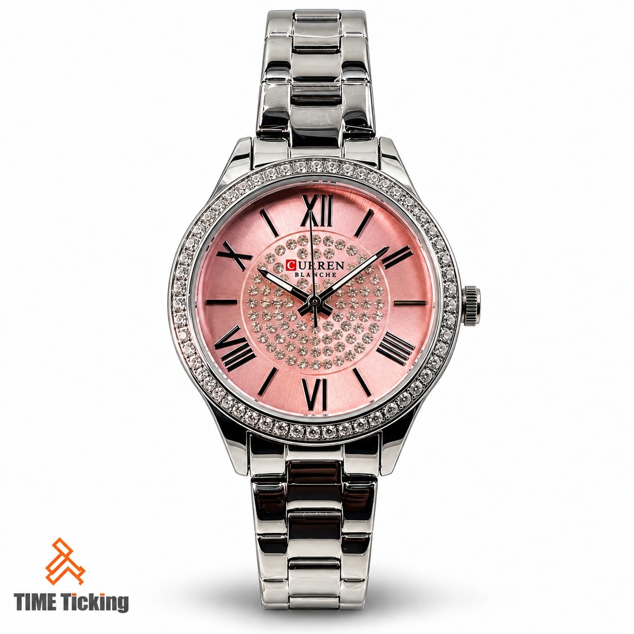 CURREN 9084 women's silver-tone bracelet watch featuring a pink sunray dial, Roman numeral hour markers, crystal-style bezel, and decorative crystal center.