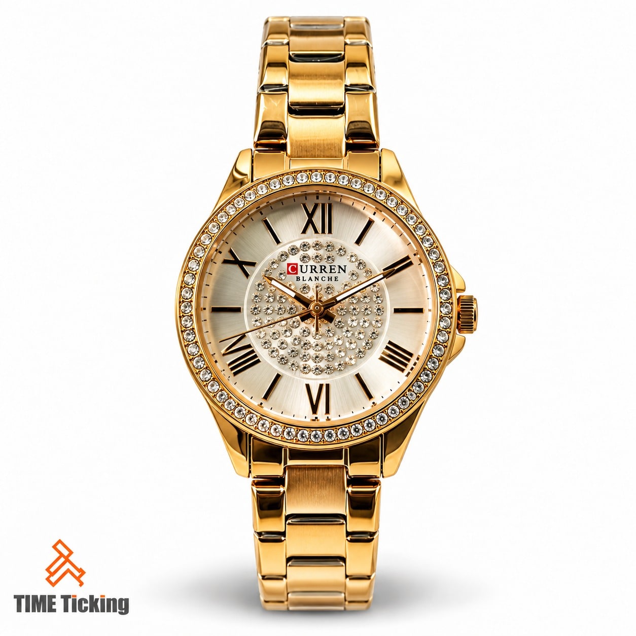 CURREN 9084 women's gold-tone watch featuring a champagne dial, Roman numeral markers, crystal-style bezel, and decorative crystal dial center.