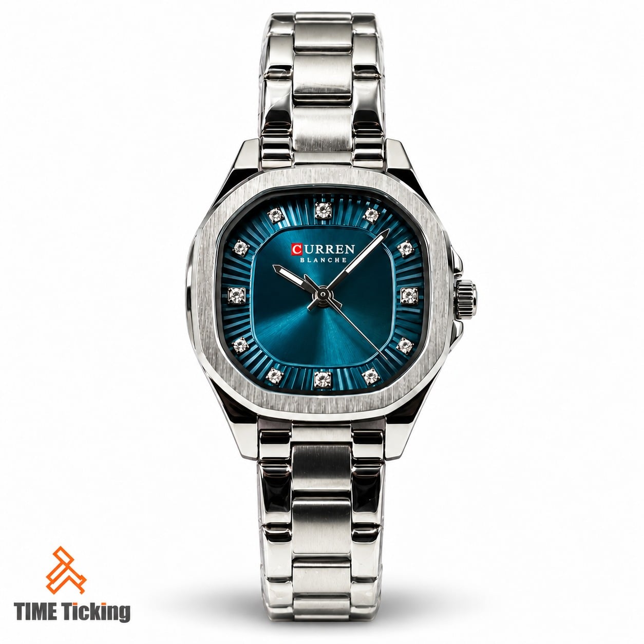 CURREN 9104 women's silver-tone watch featuring a deep blue textured dial, square crystal-style hour markers, silver baton hands, and a polished metal bracelet.