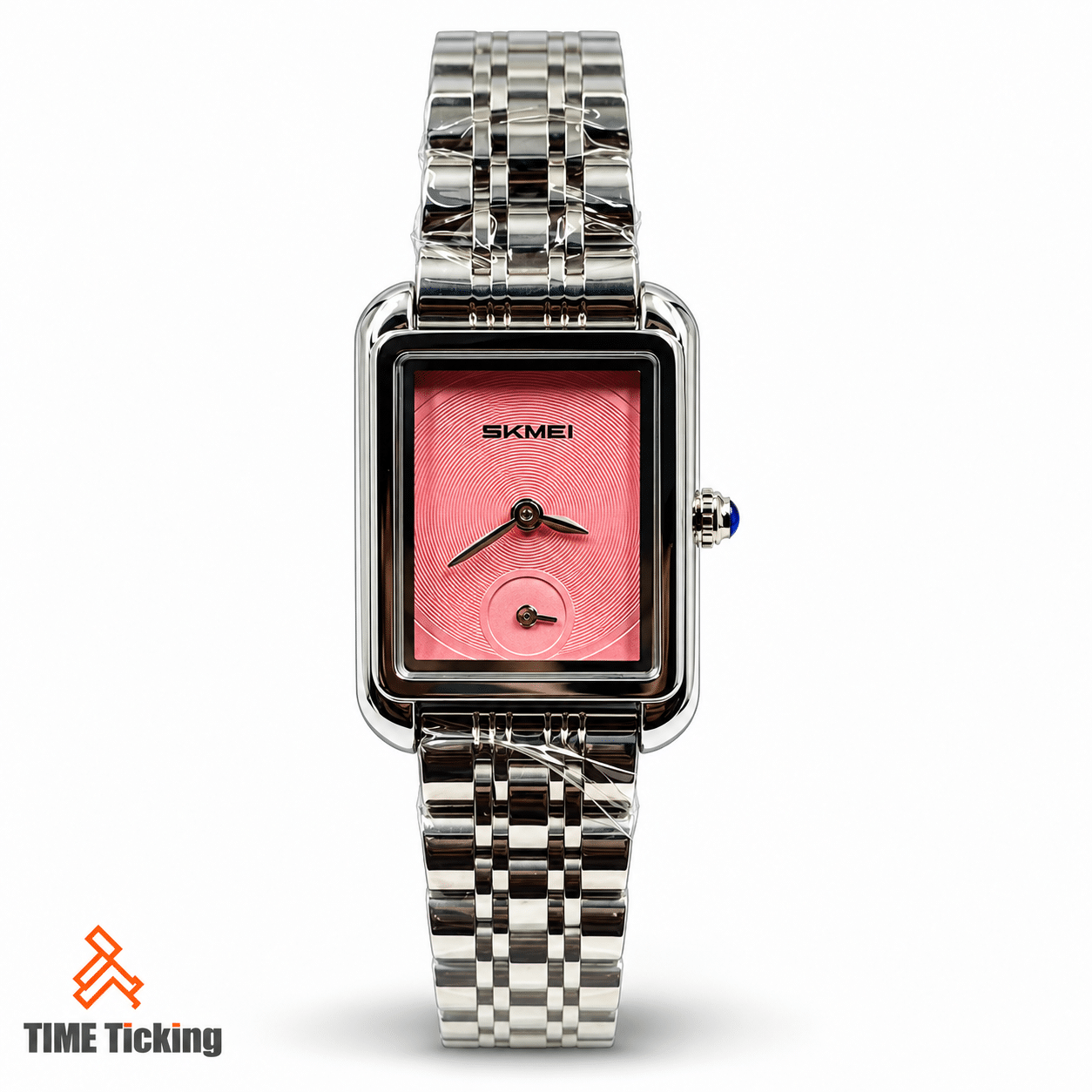 SKMEI 2670 women's quartz watch with pink textured rectangular dial, silver-tone zinc alloy case, stainless steel bracelet and elegant analog display.