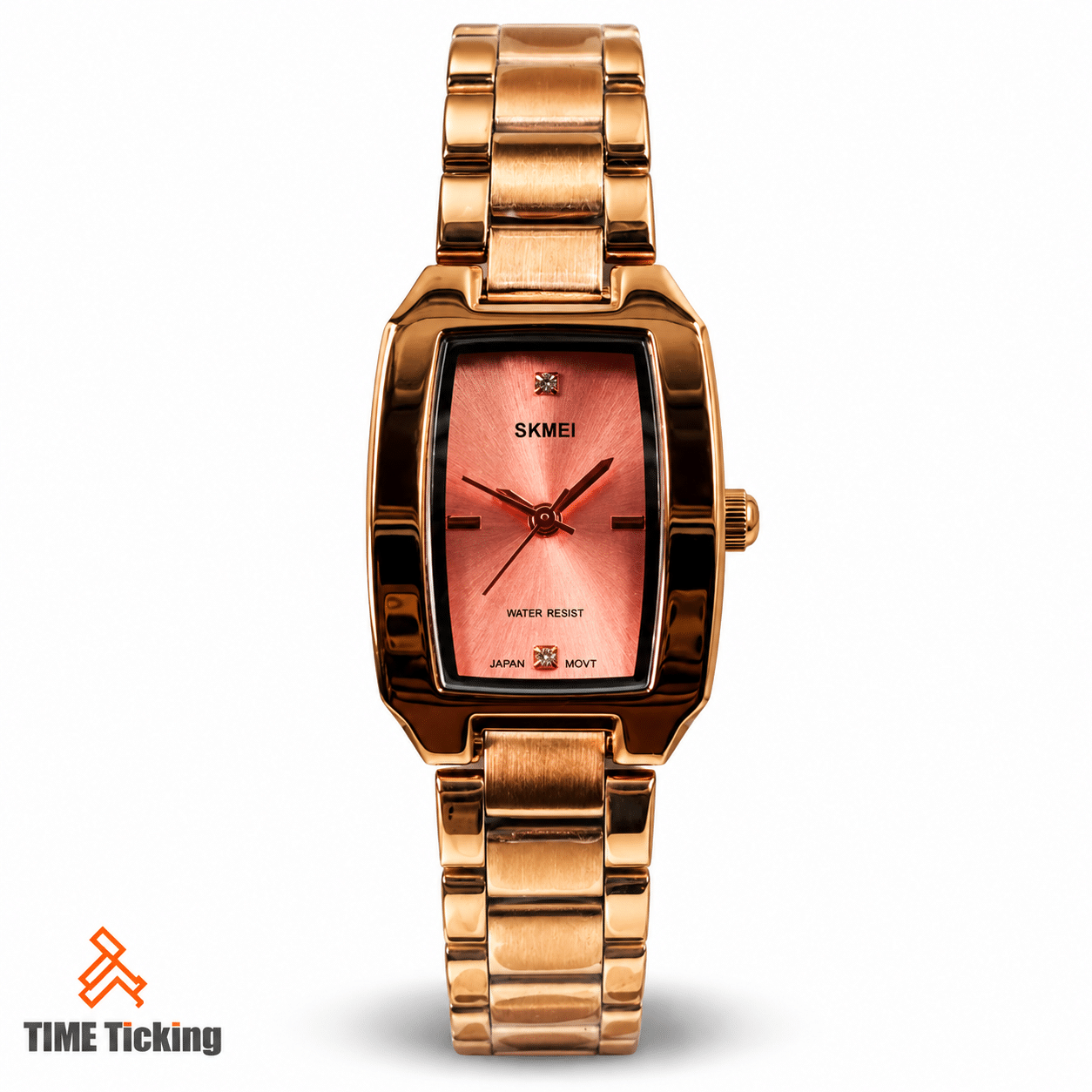 SKMEI 1400 women's rose gold watch featuring a pink sunburst dial, elegant rectangular case, gold-tone metal bracelet, minimalist hour markers, and slim analog hands.