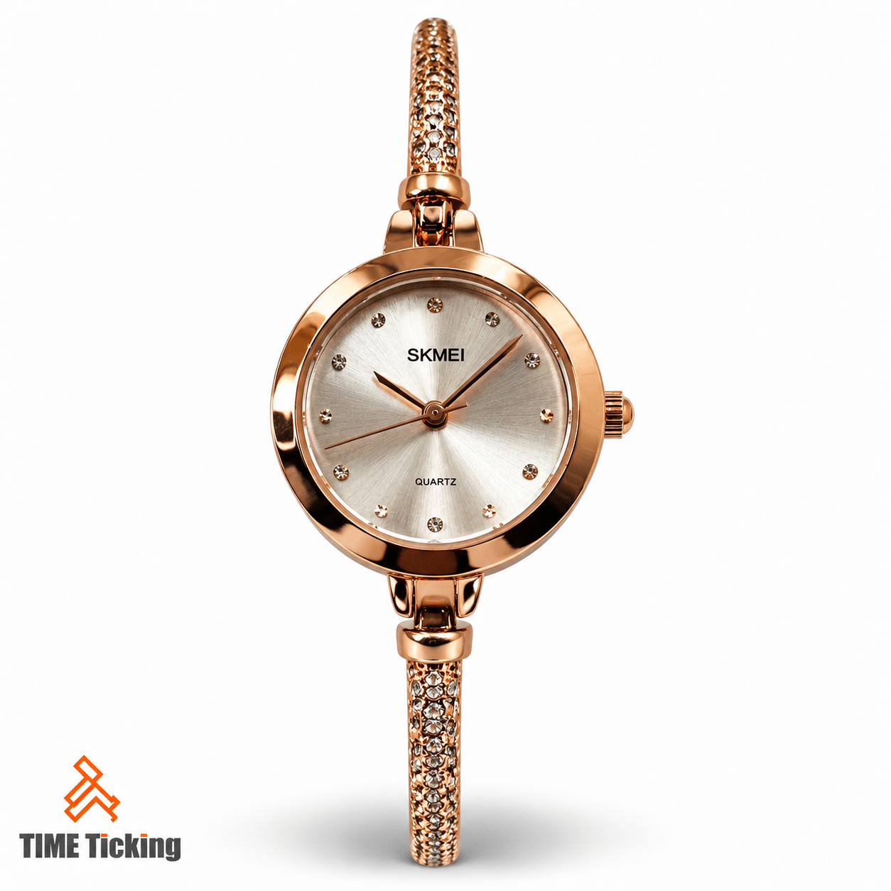 SKMEI 1805 rose gold women’s watch with a silver sunburst dial, crystal-style hour markers, polished rose gold-tone case, and decorative bracelet.