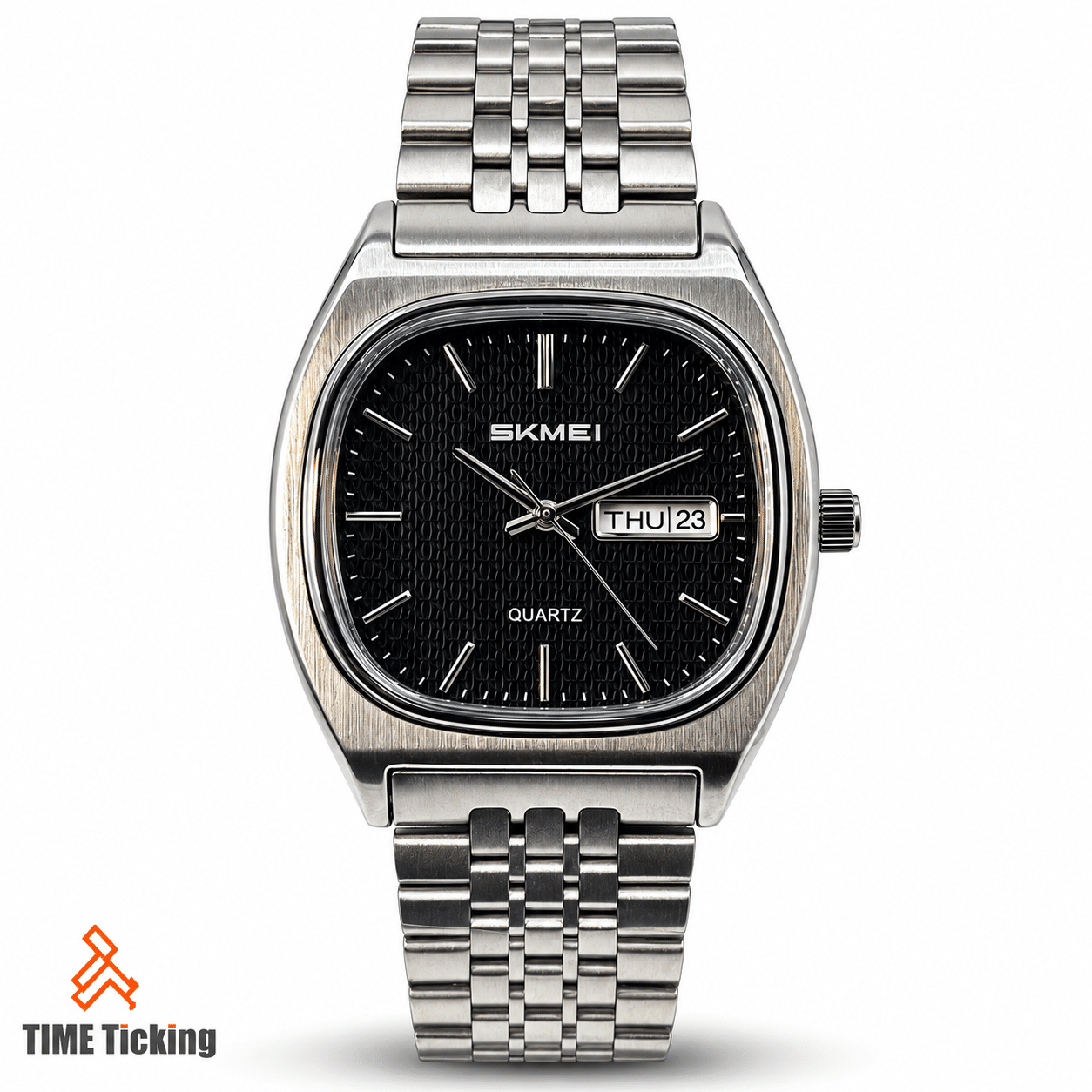 SKMEI 2420 men's silver-tone quartz watch with textured black dial, day-date window and stainless steel multi-link bracelet.