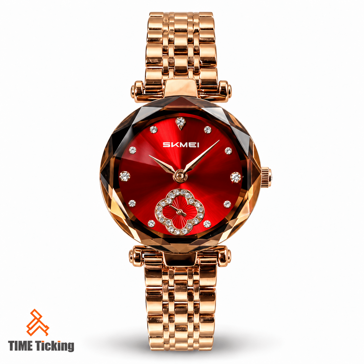 SKMEI 2718 women's rose gold watch featuring a red sunburst dial, faceted round case, crystal-style hour markers, decorative clover detail, and matching stainless steel bracelet.