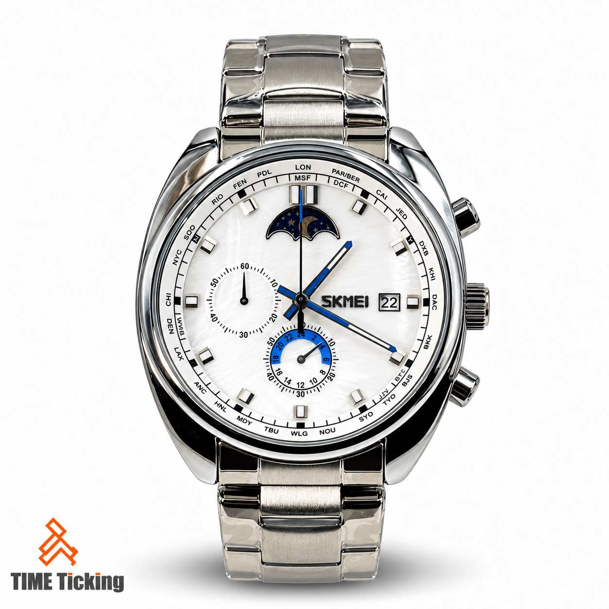 SKMEI 9325 silver-tone men's watch with white textured dial, blue-accented hands, moon phase display, date window, and stainless steel bracelet.